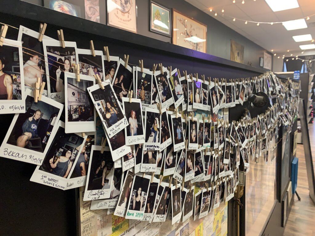 First timers wall of fame polaroids